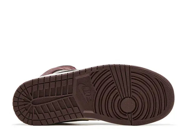 Brown sandal sole with brand logo on a white background