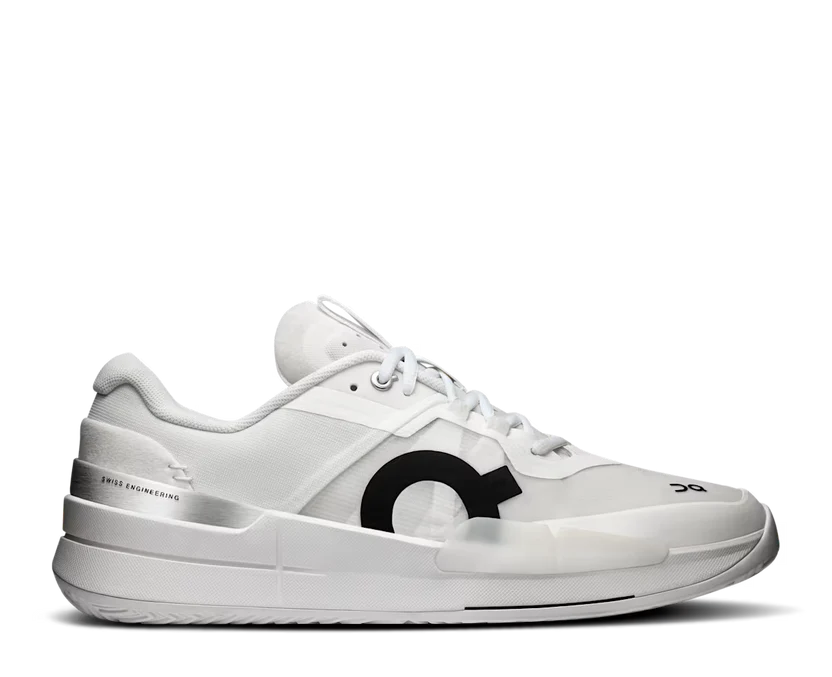 White sneaker with a black logo on a white background