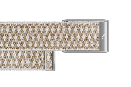 Close-up of a woven belt with a metal buckle on a white background