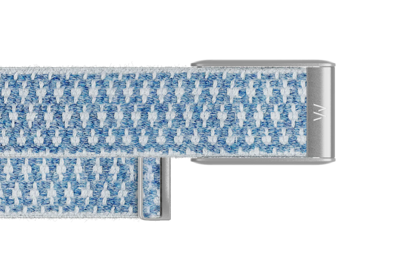 Blue and white patterned belt with a silver buckle on a white background