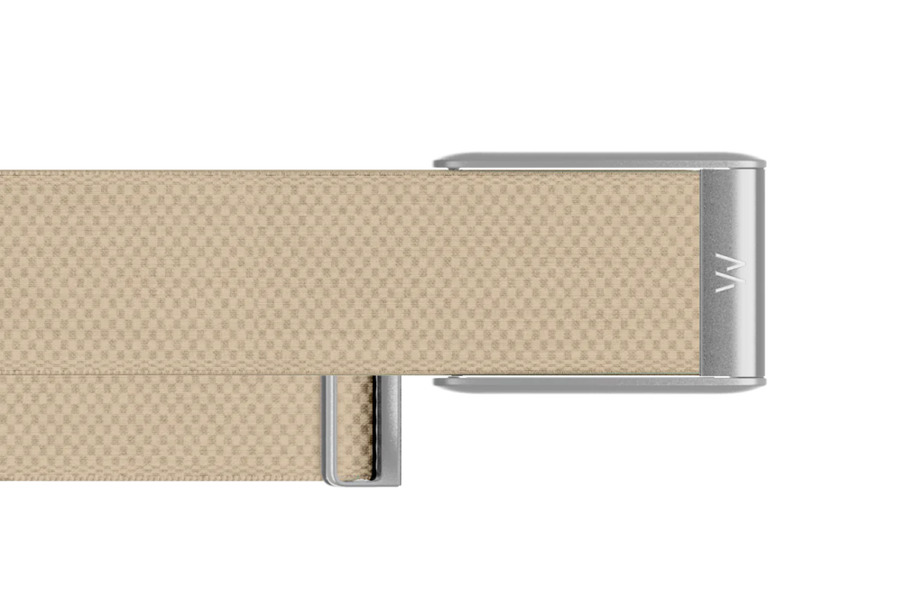 Beige belt with silver buckle on a white background