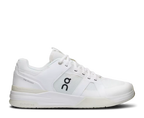 White athletic shoe with brand logo on a white background