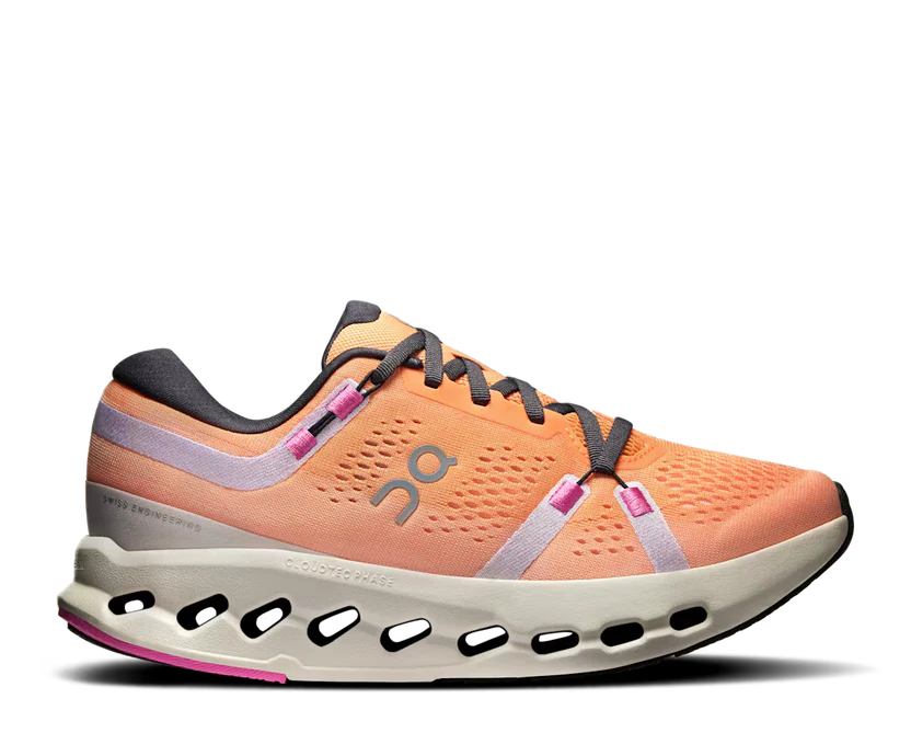 Orange running shoe with black and gray accents on a white background